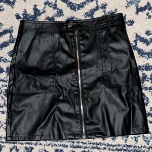 Synthetic leather black skirt size M with pockets